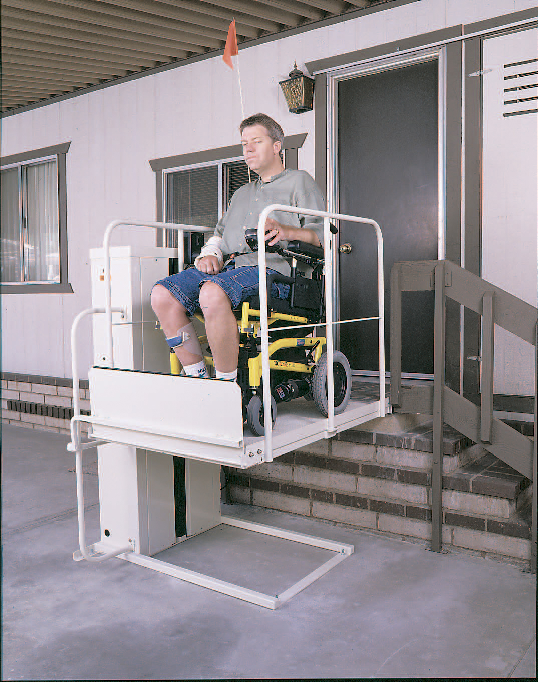 Used MACS PL50 vertical platform wheelchair lift that Electropedic buys